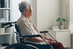 elderly nursing home resident in wheelchair