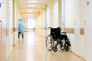 wheelchair left in empty memory care hallway