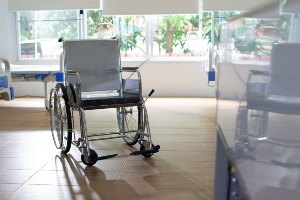 wheelchair in room in nursing home during daytime