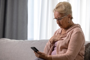 A woman looking at her phone.